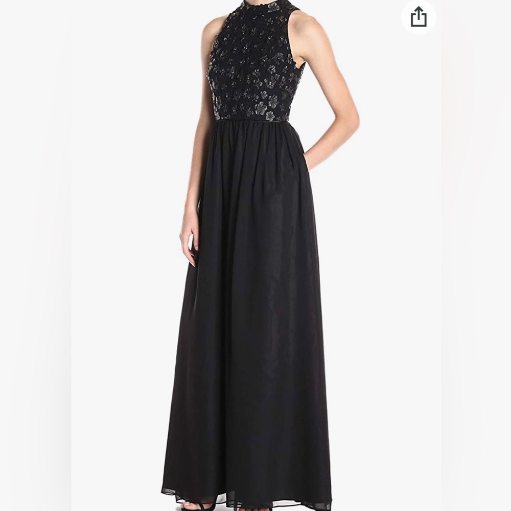 Gorgeous Adrianna Papell black dress with faux leather flowers and crystals.
